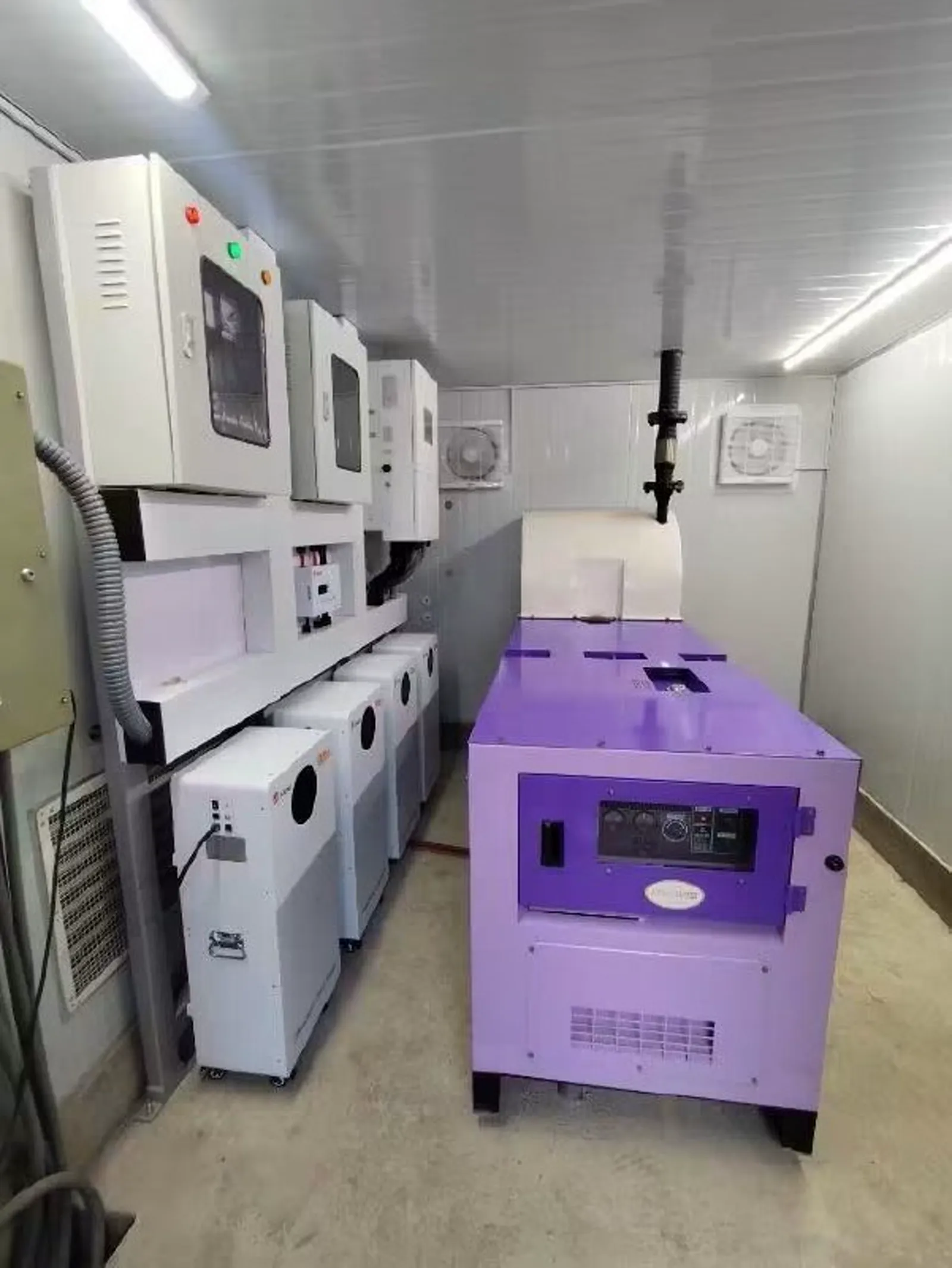 Hybrid power room with inverter banks and battery wall